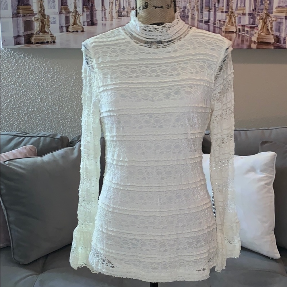 Cream lace mock neck blouse.